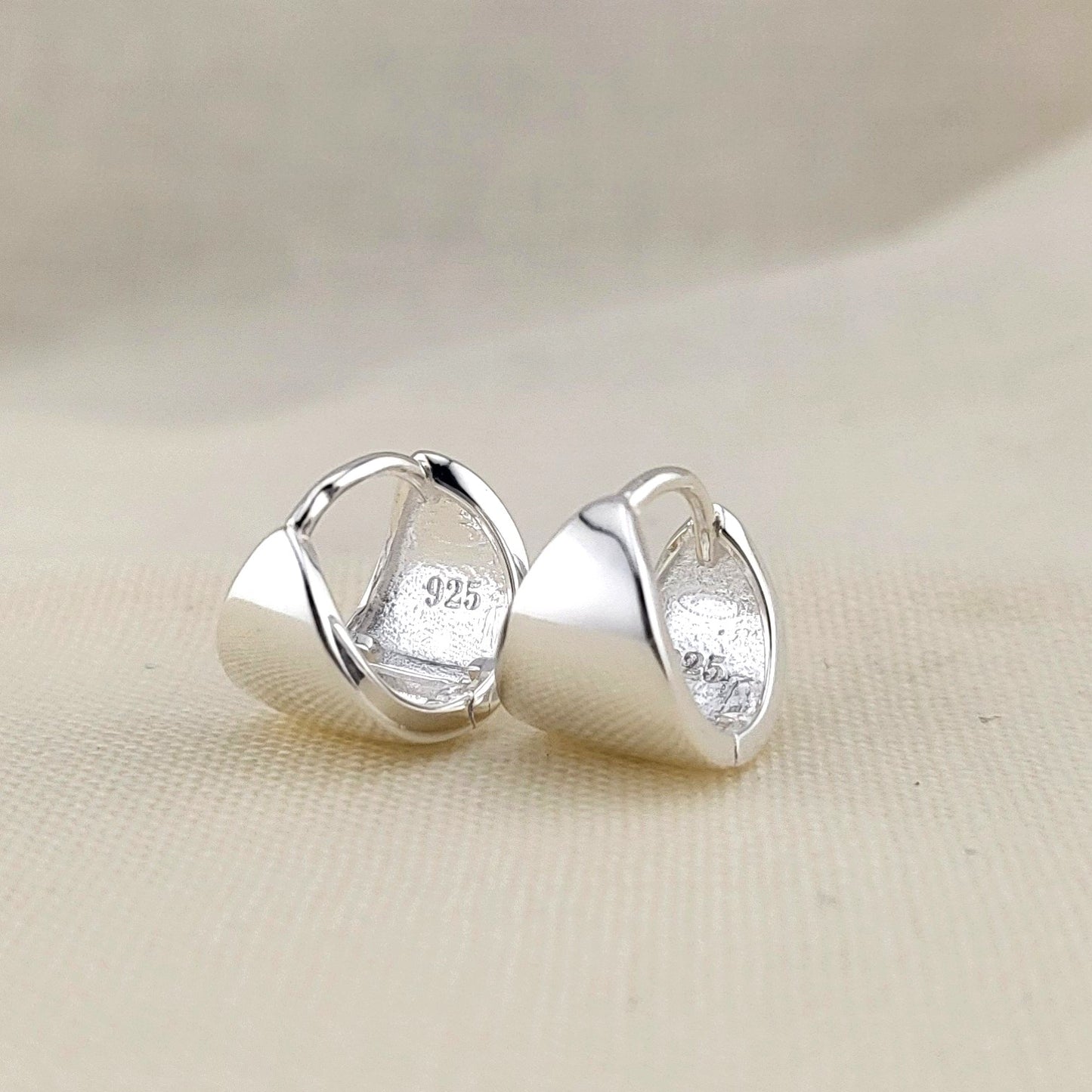 Sterling Silver Fluid Twist Huggies