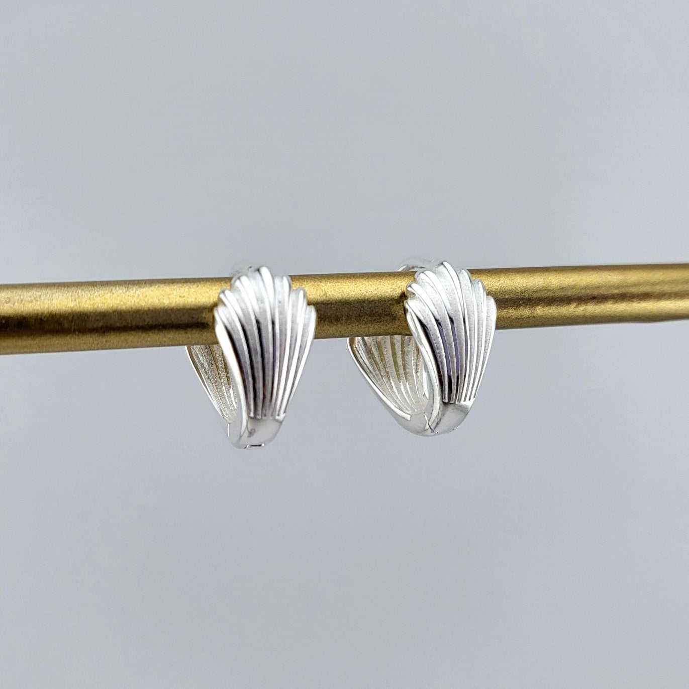 Sterling Silver Shell-Inspired Huggies Earrings