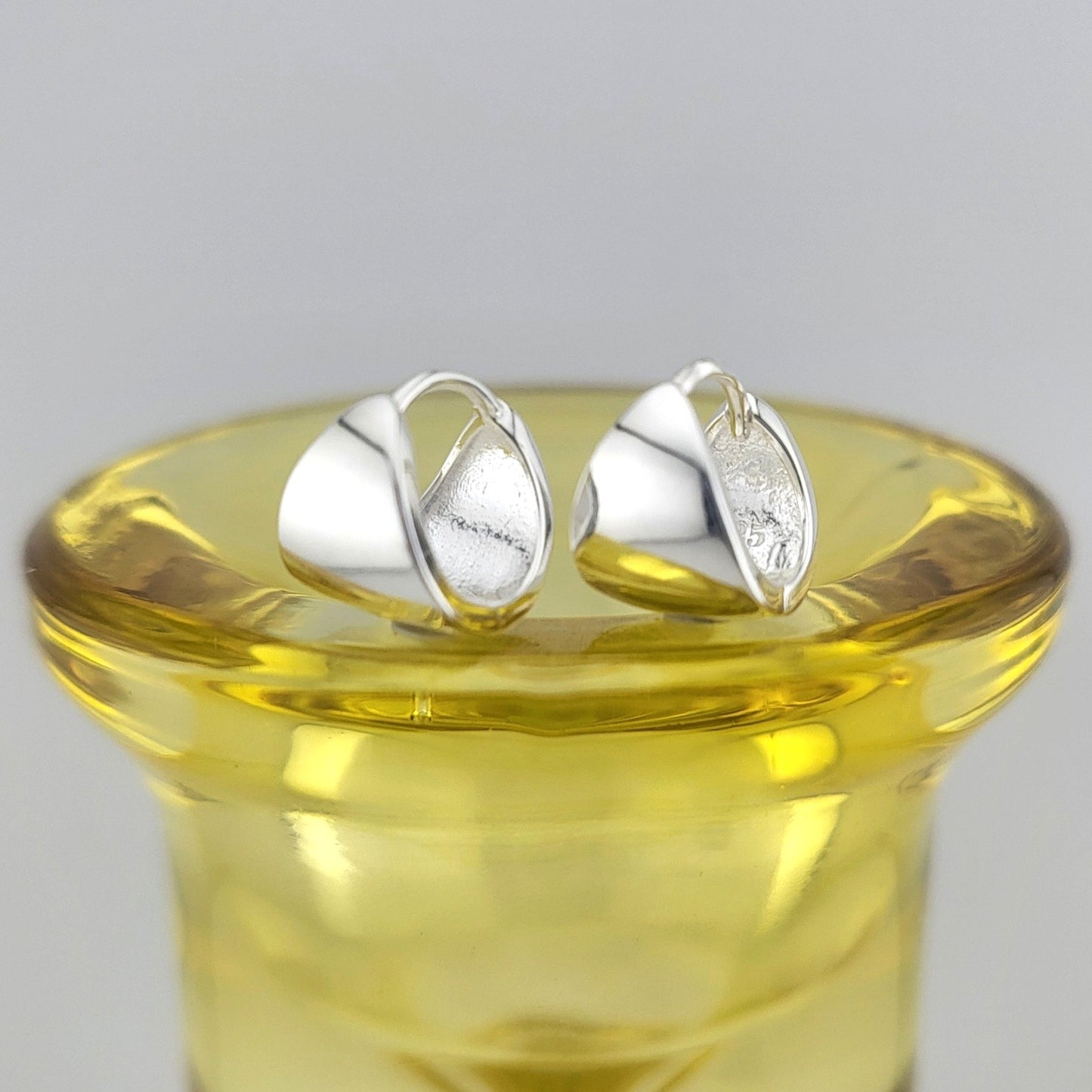 Sterling Silver Fluid Twist Huggies